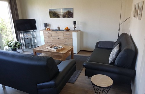 Onderdijk House | Elegant Marina House: Poolside Retreat on the IJsselmeer
