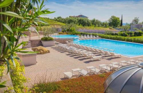 Moniga del Garda House | Coastal Escape at Marina Loft with Ocean Views & Pool