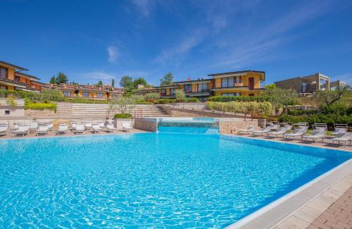 Moniga del Garda House | Coastal Escape at Marina Loft with Ocean Views & Pool
