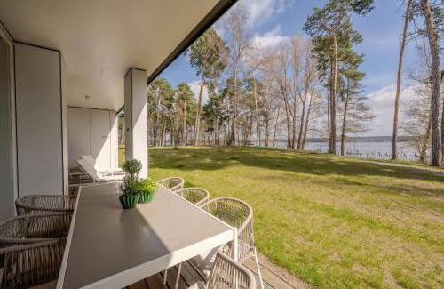 Bad Saarow Apartment | Elegant Marina Maisonette with Pool & Ocean View
