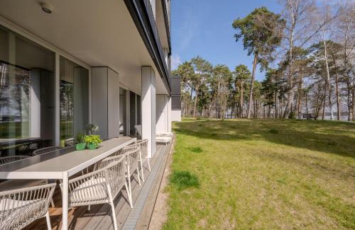 Bad Saarow Apartment | Elegant Marina Maisonette with Pool & Ocean View