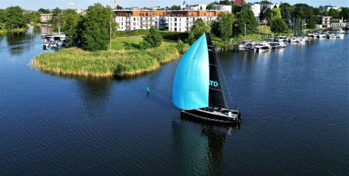 Ilawa Apartment | Relax at Marina: 4-Star Stay with Pet-Friendly Amenities