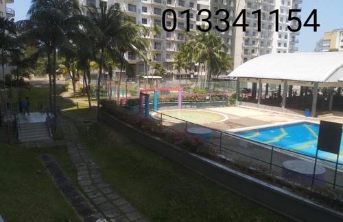 Baharu Apartment | Marina View: Family-Friendly Pool Retreat in Teluk Kemang