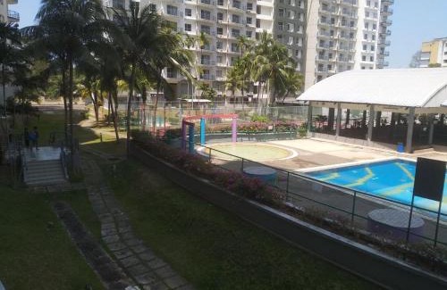 Baharu Apartment | Marina View: Family-Friendly Pool Retreat in Teluk Kemang