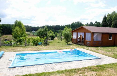 gmina Skorcz House | Discover Mark VI: Poolside Retreat with Ocean Views
