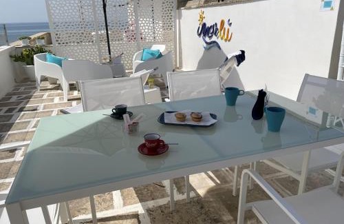 Maruggio Apartment | Experience Marlù: Oceanfront Bliss with Spa & Family Fun