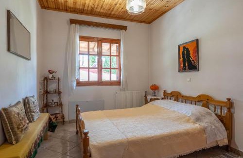 Chrysomilia Villa | Oceanfront Maroulas House with Top Guest Rating of 9.5