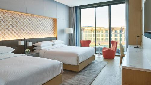 Andeok Hotel | Experience Marriott Jeju Shinhwa World Hotel's Oceanfront Bliss