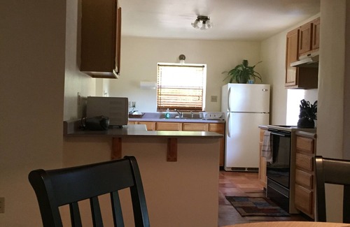 Abiquiu House | Pet-Friendly Martinez Casita - Adobe on the Plaza Retreat