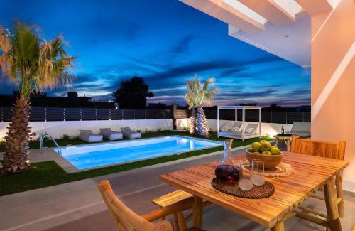Petaloudes Villa | Relax at Martinis Villas: 4-Star Oceanfront Retreat