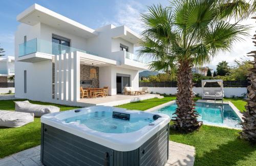 Petaloudes Villa | Relax at Martinis Villas: 4-Star Oceanfront Retreat