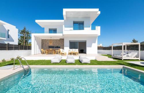 Petaloudes Villa | Relax at Martinis Villas: 4-Star Oceanfront Retreat
