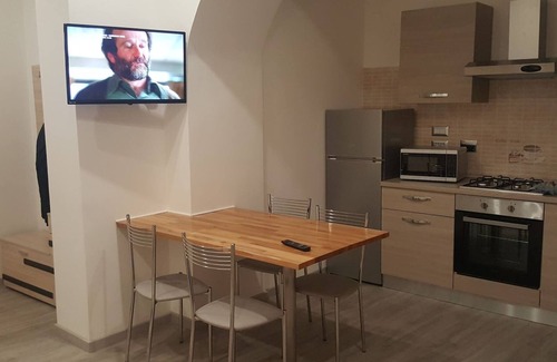San Martino Apartment | Cozy Flat Martino: Child-Friendly with Kitchen Amenities