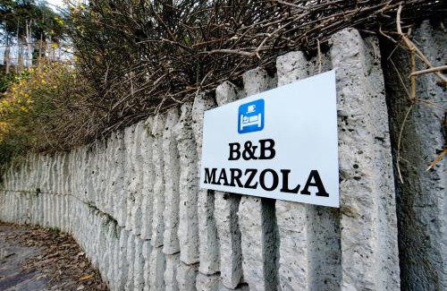 Ravina Bed & Breakfast | Pet-Friendly Marzola: Family Comfort with Breakfast Included