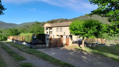 Sant Joan les Fonts House | Experience Mas Espuña: A 4-Star Rural Retreat for Families
