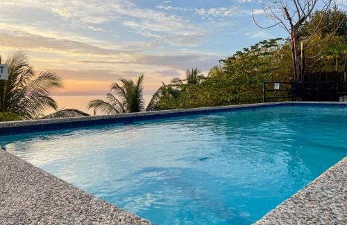 Santander Resort | Oceanfront Masayahin Cabanavillas with Pool & Restaurant