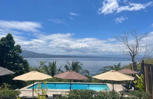 Santander Resort | Oceanfront Masayahin Cabanavillas with Pool & Restaurant