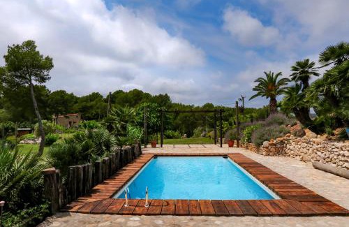 Olivella Apartment | Discover Masia Pou de la Vinya: Oceanfront Retreat with Pool