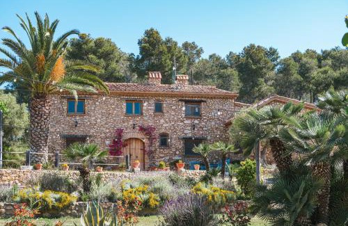 Olivella Apartment | Discover Masia Pou de la Vinya: Oceanfront Retreat with Pool