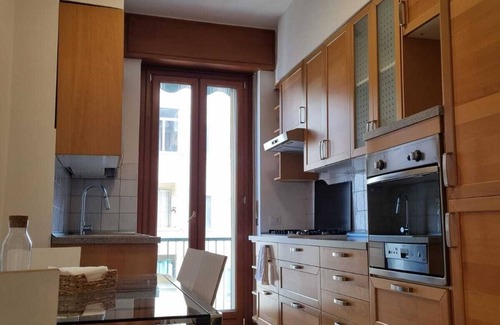 Giambellino Apartment | Cozy Massis House with Terrace and Family-Friendly Amenities