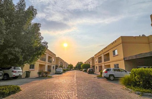 Doha Apartment | Elegant Master Bedroom with Pool & Entertainment Facilities