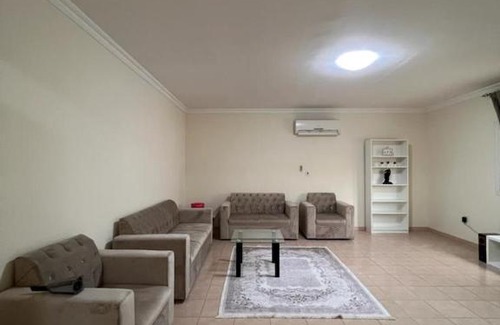 Doha Apartment | Elegant Master Bedroom with Pool & Entertainment Facilities