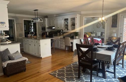 Evans House | Masters Rental: Ideal Location with Family-Friendly Amenities