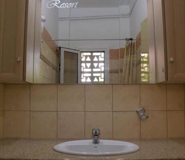 Gouvia Apartment | Mathraki Resort: Family-Friendly Stay with Oceanfront Views