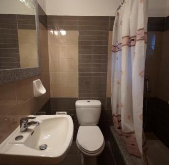 Gouvia Apartment | Mathraki Resort: Family-Friendly Stay with Oceanfront Views