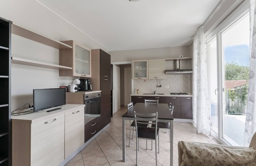 Rivoltella Apartment | Matteotti 2: Oceanfront Retreat with Pool & Spa Amenities