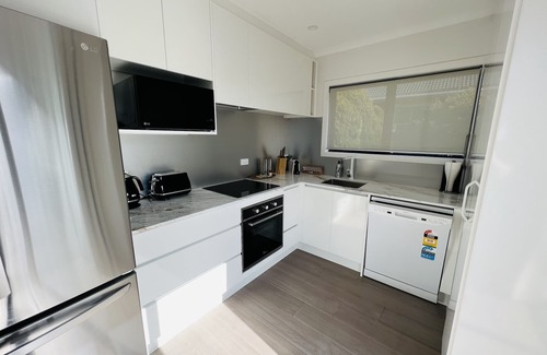 Auckland House | Experience Matuhi Deluxe: Family-Friendly Two-Bedroom Retreat