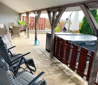 Villany Apartment | Discover Maul: Oceanfront Haven with Hot Tub & Pet Friendly