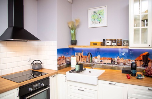 Gdansk City Center Apartment | Discover Maya's 62: Family-Friendly Hotel with Spa & Kitchen
