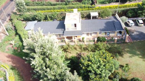Nyeri Hotel | Cozy Mayas Suites: Family-Friendly with Onsite Dining