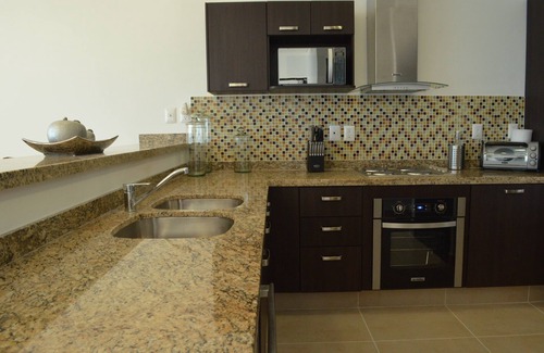 Cerritos Condo | Oceanfront Getaway at Pearl Tower 705A - Rated 9.8
