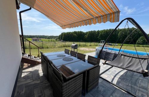 Orzysz House | Discover Mazurska Sielanka: Ocean View & Pet Friendly Stay