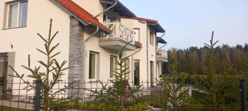 Rydzewo Apartment | Relaxing Mazurskie Wzgórze BIS: Pool, Pet-Friendly Retreat