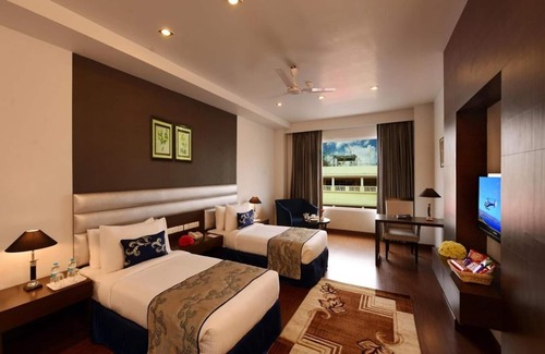 Moradabad Hotel | Inviting MB Greens Clarks Inn with Spa and Family Amenities