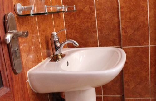 Bafoussam Hotel | Budget-Friendly Mbatkam Palace with Family Amenities