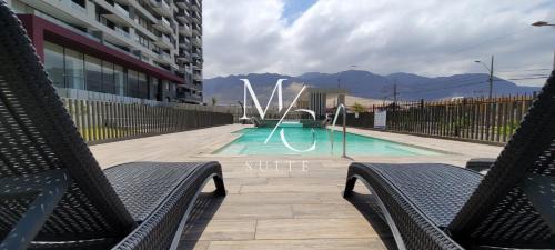 Antofagasta Apartment | MC Suite Norte: Family-Friendly Stay with Pool Access
