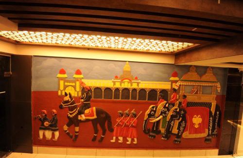 Mysore Hotel | Family-Friendly MC Suites Mysuru with Restaurant & Kitchen