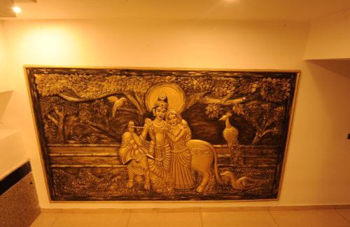 Mysore Hotel | Family-Friendly MC Suites Mysuru with Restaurant & Kitchen