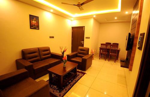 Mysore Hotel | Family-Friendly MC Suites Mysuru with Restaurant & Kitchen