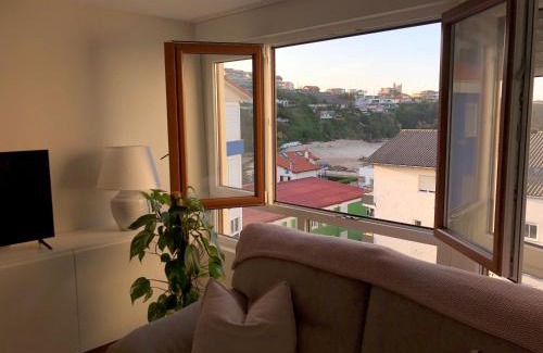 Suances Apartment | Beachfront Stay with Private Parking & Ocean Views