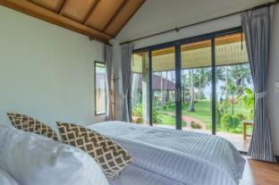 Ko Kood Resort | Relax at Medee Resort: Oceanfront Bliss Awaits You