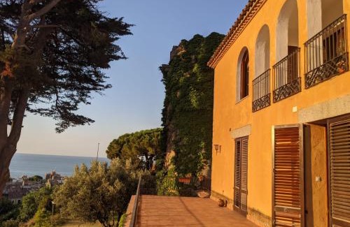 Caldes d'Estrac Villa | Enchanting Medieval Tower & Villa with Oceanfront Views