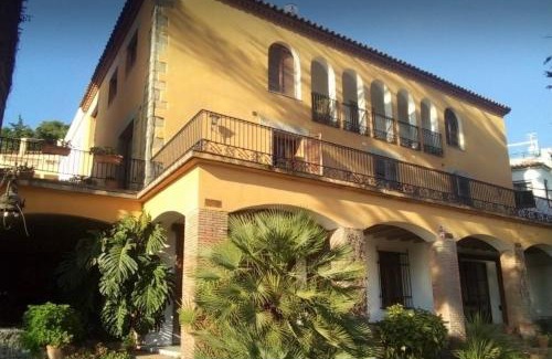 Caldes d'Estrac Villa | Enchanting Medieval Tower & Villa with Oceanfront Views
