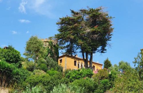 Caldes d'Estrac Villa | Enchanting Medieval Tower & Villa with Oceanfront Views