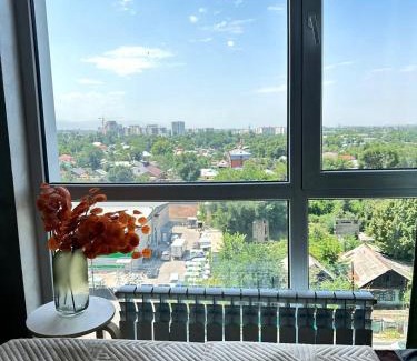 Almaty Apartment | Scenic MedinahotelKZ: Mountain Views & Family-Friendly Stay