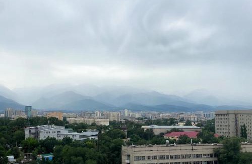Almaty Apartment | Scenic MedinahotelKZ: Mountain Views & Family-Friendly Stay